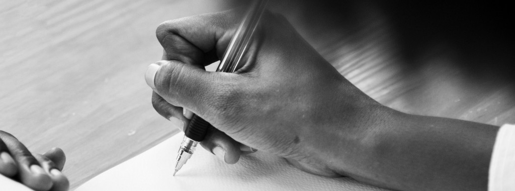 Hand with pen narrow